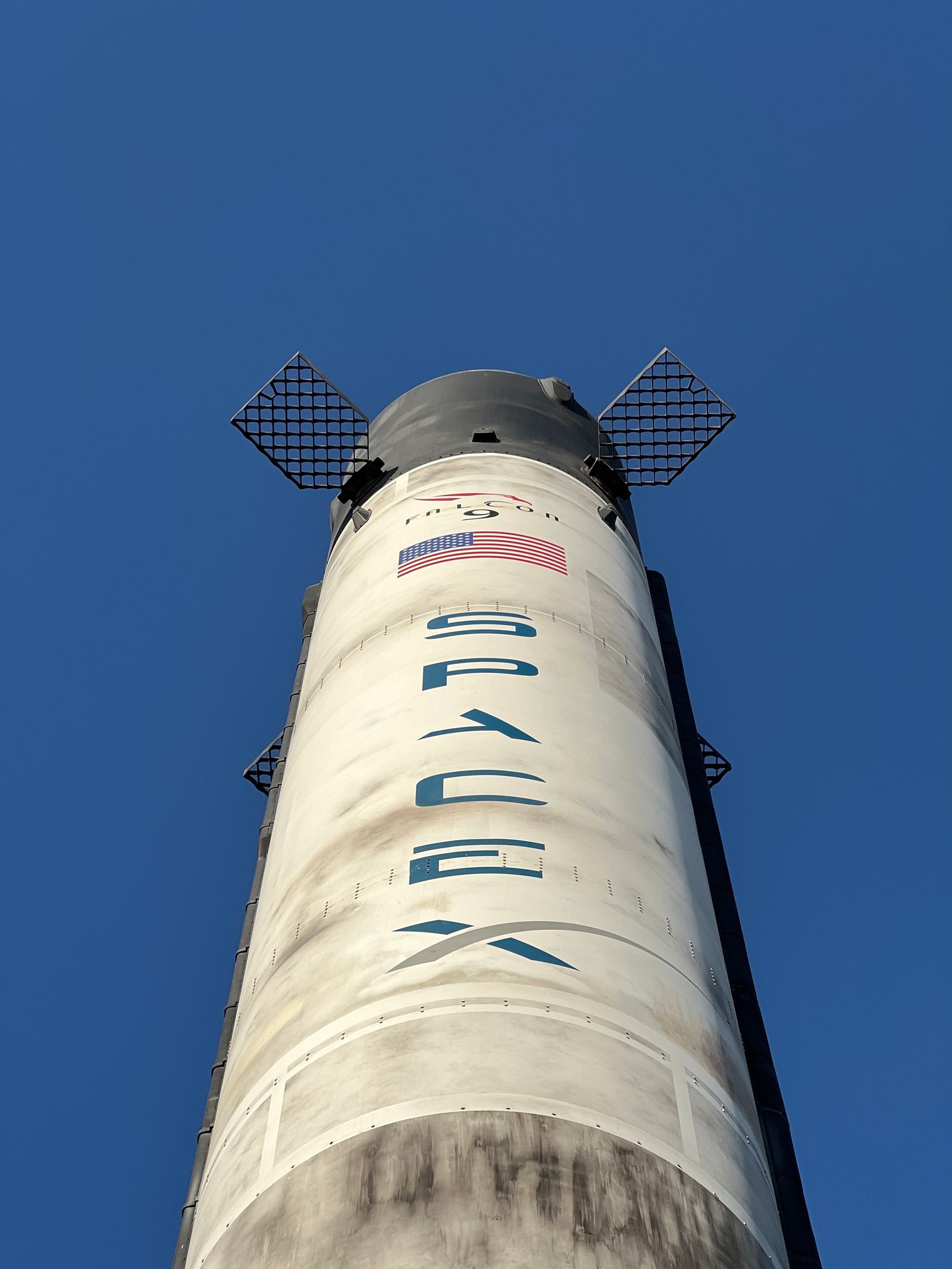 The SpaceX headquarters tower against the sky