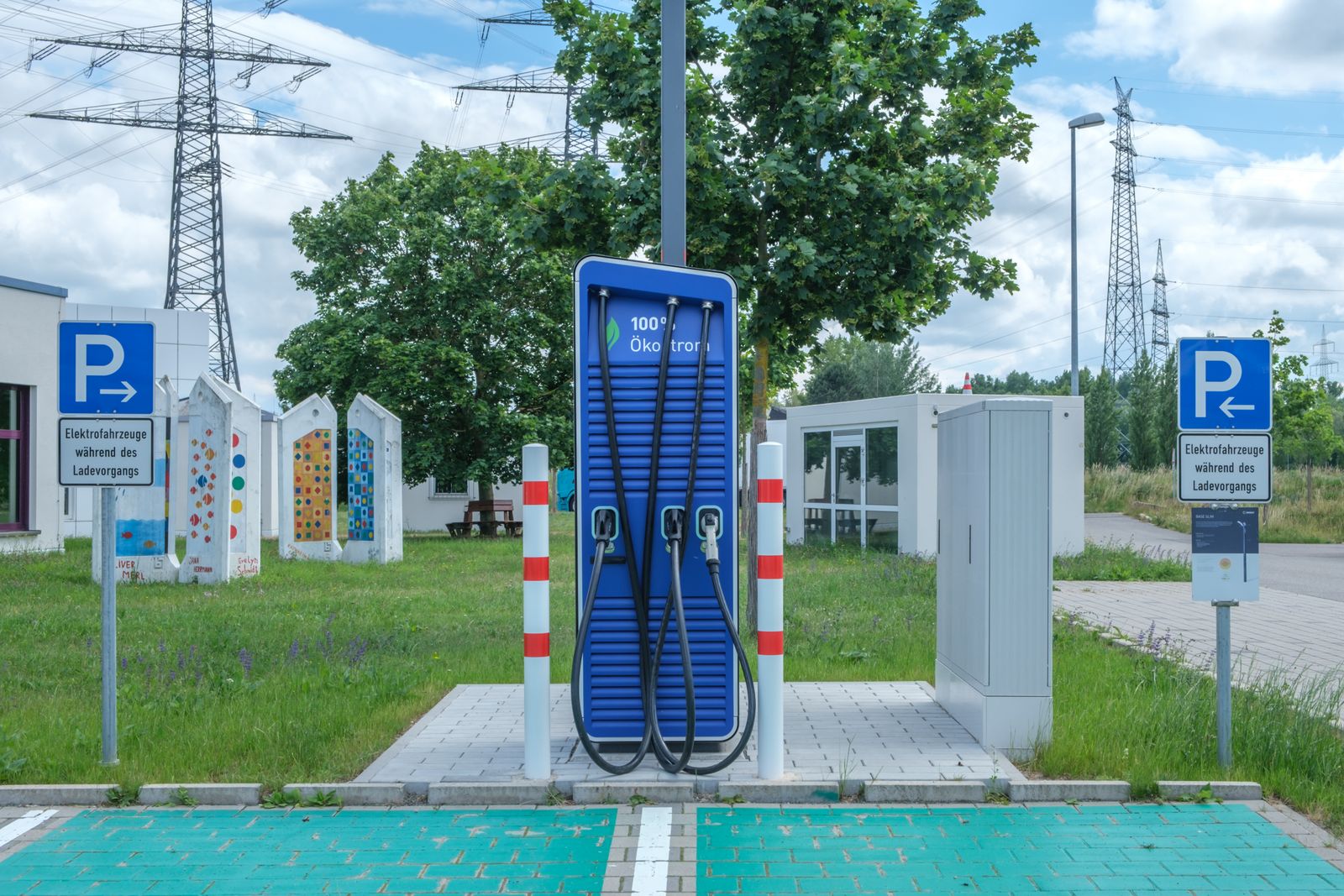 An electric car plugged into a charging station
